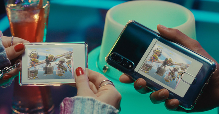 Sharing experiences in the game world as instax prints